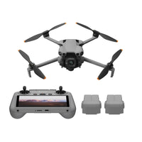 DJI Mini 5 Pro with remote control and batteries on a white background